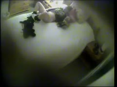 A lonely, elderly lady is seen stroking her cunt on a concealed camera.